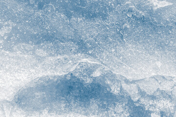 Ice texture crystal, blue tones background. Textured, cold, frosty surface of ice.