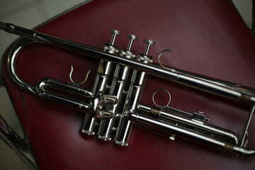 Close-up Trumpet Player Practicing in a Music Rehearsal Room © maha