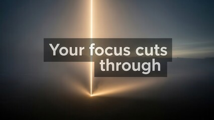 Light beam cuts through darkness, representing focus