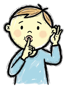 Boy Signals Silence with Finger to Lips