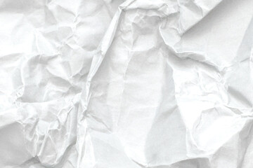 White crumpled paper texture background with realistic folds and shadows.