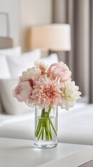 Elegant Pastel Flower Bouquet in Glass Vase on Table