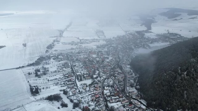 Aerial view of Blatnica Village - Valley in Mala Fatra mountains in Slovakia, winter landscape, 4K, ProRes
