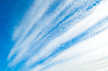 Sweeping blue sky landscape, clouds in the blue sky