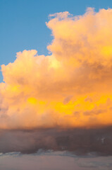 Sunset sky with colorful golden clouds, evening sunset sky landscape