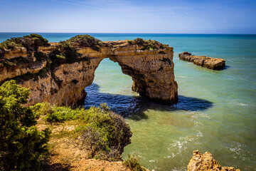 View Sunlit Archway Carved Relentless