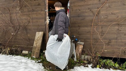 The guy changes the tires on the wheels of his car