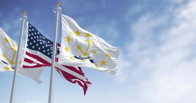 Rhode Island state flag waving with the american flag on a clear day