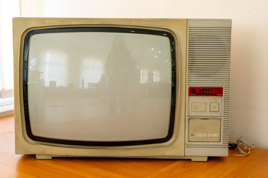 Old TV on table. Vintage television at home. Ukraine, Kyiv - March 27, 2024