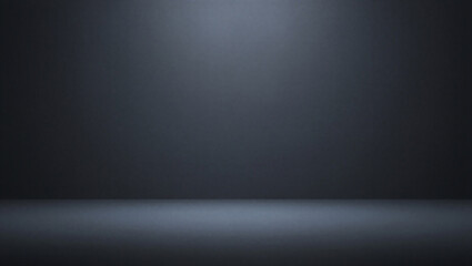 Dark room with spotlight shining down on empty floor