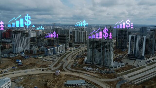 Aerial drone view of a modern city skyline with active construction site and cranes, combined with animated financial symbols, rising charts, and dollar icons overlay. Real estate investment 4k.