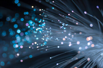 Colorful light trails against a dark background.