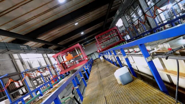Industrial Electroplating Facility with Automated Conveyor System and Processing Tanks