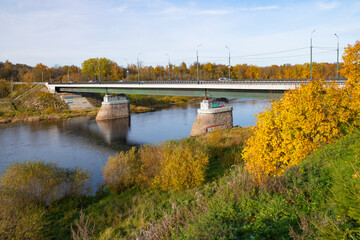 View of the city bridge over the Luga river on a sunny October day