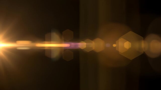 Real Cinematic Lens Flare Overlay on Black Background Slow Motion.
