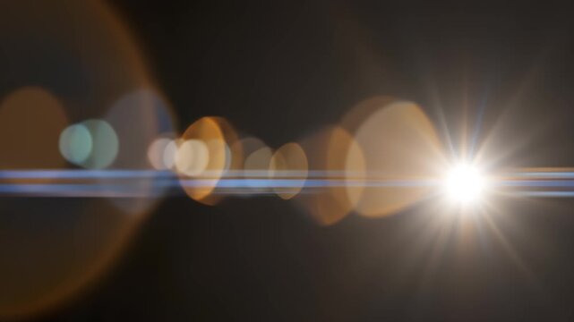 Real Cinematic Lens Flare Overlay on Black Background Slow Motion.