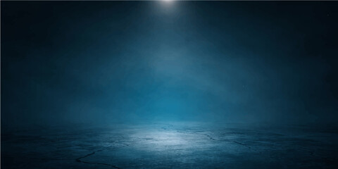 Obraz premium A dark blue spotlight illuminates a misty night sky texture where light blue smoke and storm clouds blend into a deep ocean backdrop of space and steam