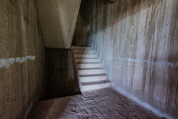 Concrete stairs in an old building.