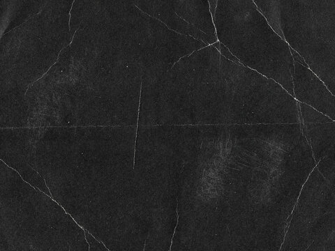 Gritty Folded Paper Texture Overlay. Distressed Creased Black Paper Background. Grunge Analog Scan Surface, Film  Texture