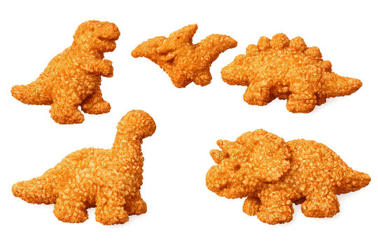 Assortment of breaded dinosaur chicken nuggets, ideal for kids' meals, fast food concepts, or quick, convenient snacks