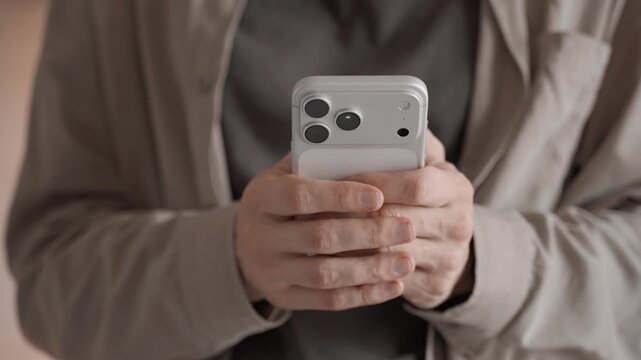 Man Using Apple iPhone 17 Pro Max Close Up