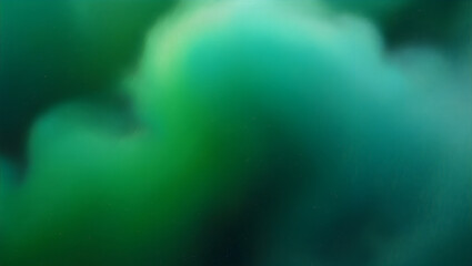 Green and teal colors blend softly in a dreamlike gradient.