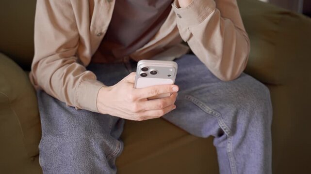 Man Using Apple iPhone 17 Pro Max Indoors