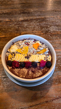 Delicious smoothie with tropical fruits and crunchy toppings Bali Ubud