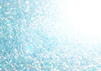 Obraz premium A bright blue sparkling surface with shimmering particles and intense light.