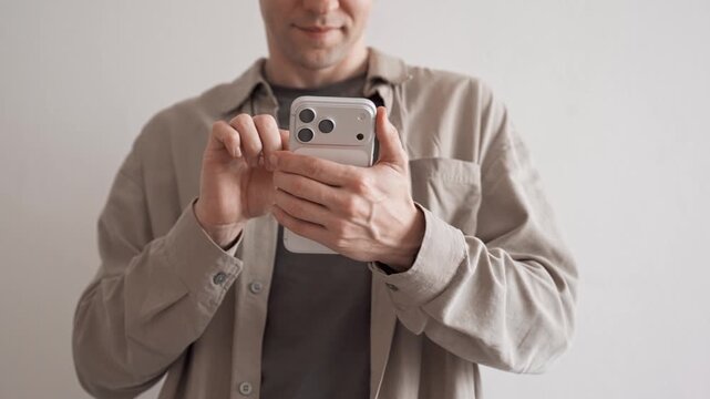 Man Using Apple iPhone 17 Pro Max Smartphone