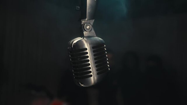 Vintage Studio Microphone in Dramatic Smoke and Low Light