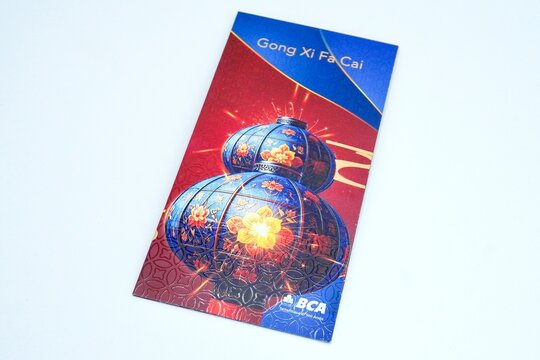 Jakarta, Indonesia - February 17th, 2026 - Chinese New Year red envelope from BCA isolated on horizontal white background.