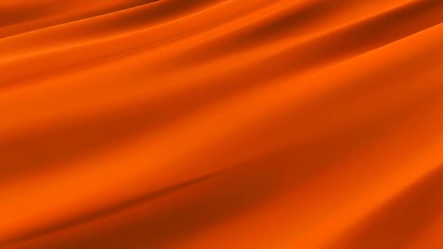 Orange satin fabric flowing with soft folds and shadows