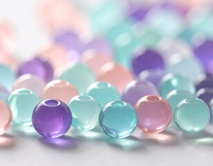 Pastellfarbene Glasperlen im sanften Farbverlauf