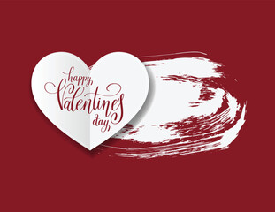 White paper heart with elegant Happy Valentines Day calligraphy featuring a textured brush stroke on a deep red background perfect for romantic greetings and holiday promotions
