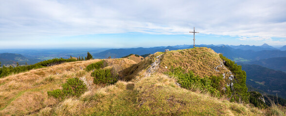 summit  Latschenkopf mountain with cross, autumnal scenery bavarian alps