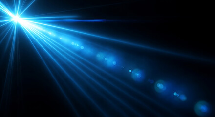 Fototapeta premium bright blue light effect radiating with dynamic rays and optical lens flare on a dark background illustrating technology digital energy.