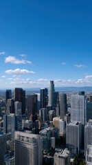 Fototapeta premium Aerial View of Financial District with Modern Skyscrapers and Blue Sky Background