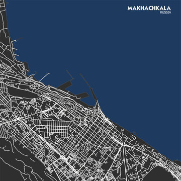Detailed black and blue city street map of Makhachkala, Russia, featuring urban road networks and coastal geography layout.