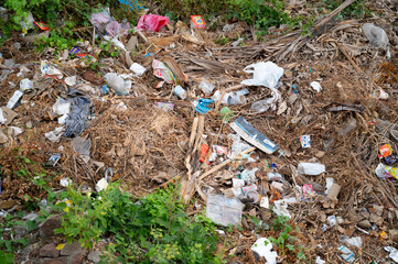 Riverbed in Hampi, waste in India, plastic pollution and environment damage, garbage dump, old clothes, Coastal Cleanup Day