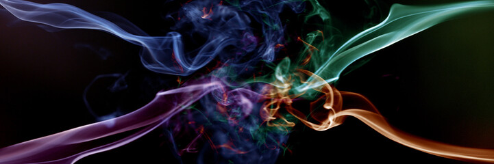 Obraz premium Abstract smoke swirling in vibrant colors, creating a dynamic visual effect