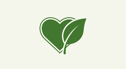 Green leaves forming a heart shape symbolizing nature and eco-friendliness.
