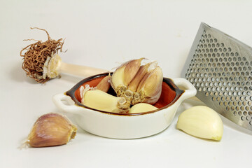 garlic cloves in a bowl