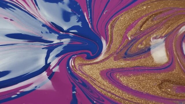 Swirls of paint mix in a vibrant display showing creative expression and art techniques in close-up at an art studio