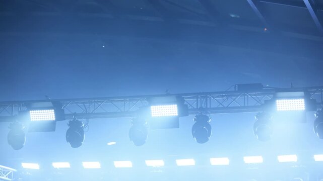 Ceiling Spotlights And Blue And White Spotlights Illuminate The Concert Stage