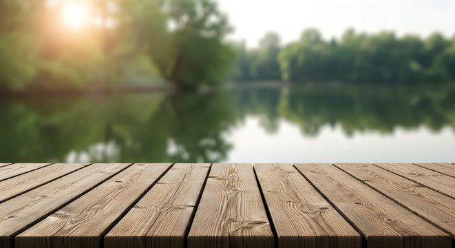 A wooden dock on a lake with trees in the background