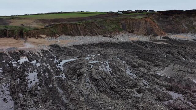 Panoramic view of Widemouth Bay beach in Cornwall viewed from the sea and rocks