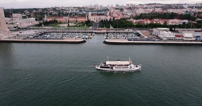 Aerial drone view of Jeronimos Monastery and Discoveries Monument, Lisbon, Portugal 
