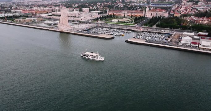 Aerial drone view of Jeronimos Monastery and Discoveries Monument, Lisbon, Portugal 