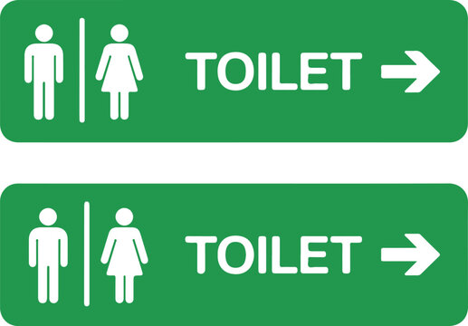 Two green rectangular signs indicate the direction of the restroom with male and female figures and an arrow